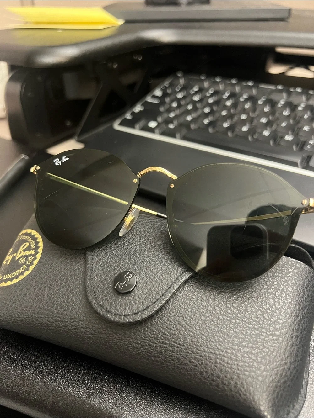 Ray-Ban Round Sunglasses — Black Frame with Dark Green Lenses